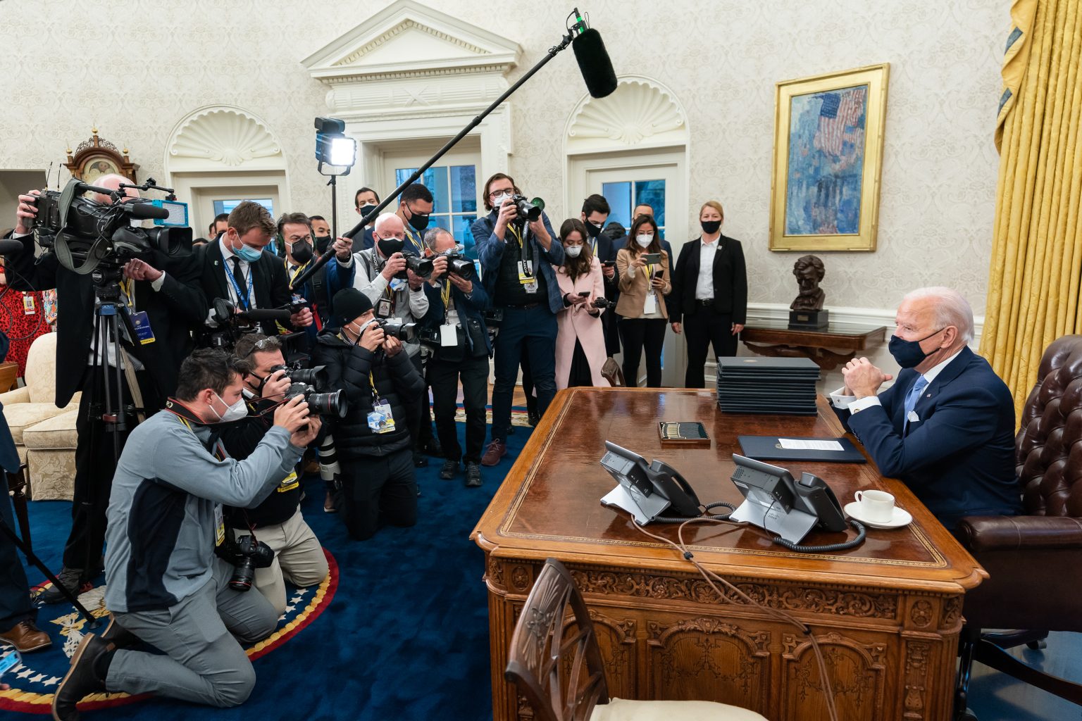 President Joe Biden makes remarks to the press as he prepares to sign a number of executive orders and Presidential actions a few hours after his inauguration Wednesday, Jan. 20, 2021, in the Oval Office of the White House. (Official White House Photo by Adam Schultz)
